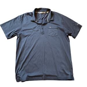 Travis Mathew Men’s Polo. Pima Cotton. Blue. Has embroidery on sleeve. Size XXL